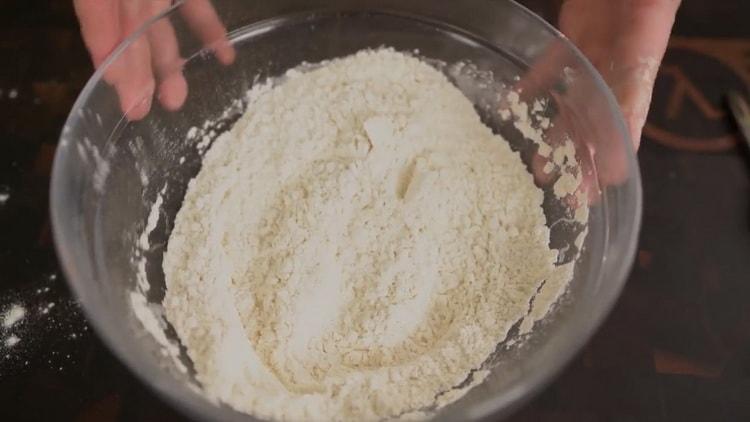 To make a classic pizza, sift the flour