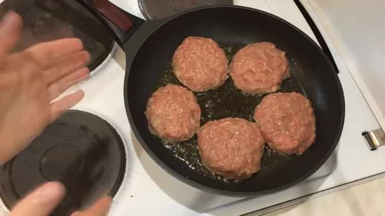 To cook ground beef patties, heat a skillet