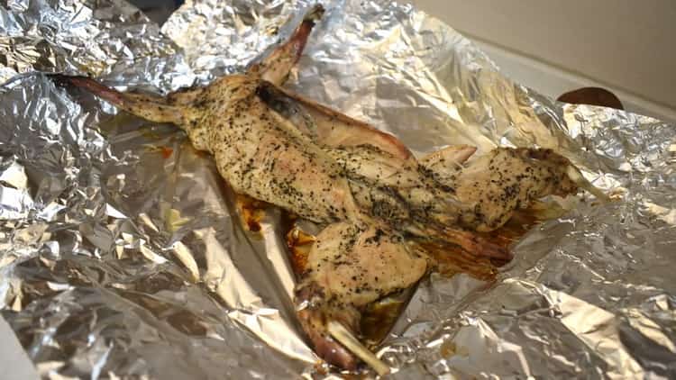 Fragrant rabbit in the foil in the oven is ready