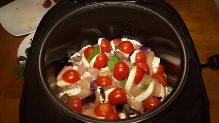 To cook chicken breast in a slow cooker, put the meat in a bowl