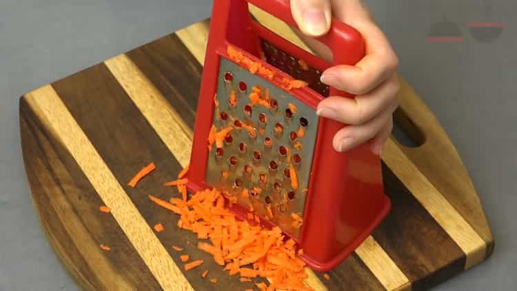 To cook pickled cabbage, grate carrots