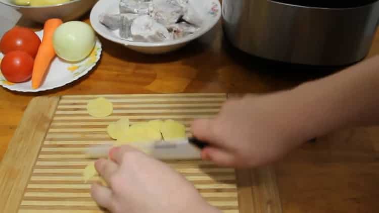 To cook pollock in a slow cooker, cut potatoes