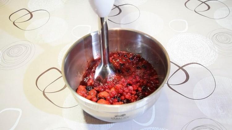 To make fruit juice from frozen berries, grind the ingredients with a blender