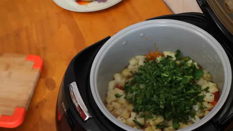 To cook vegetable stew in a slow cooker, cut greens
