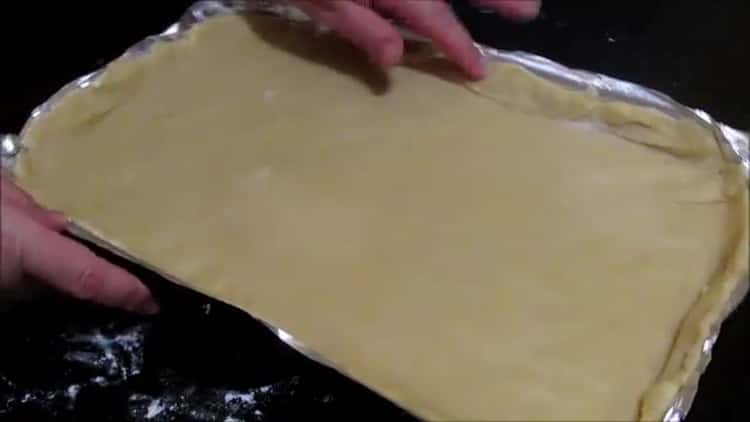 To prepare shortbread cookies with jam, prepare a baking sheet