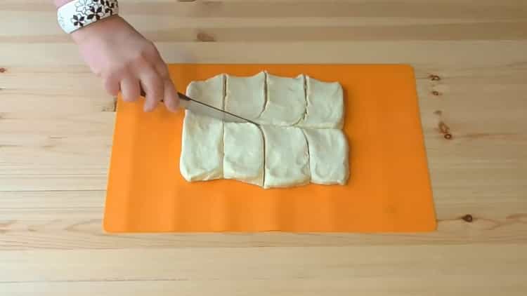To prepare cookies on sour cream roll a layer
