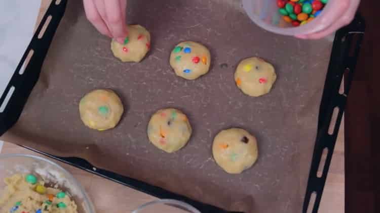 To make cookies with mmdems, preheat the oven