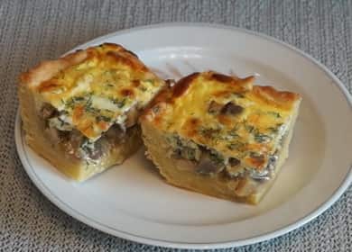 Open mushroom pie with cheese cream filling in the oven