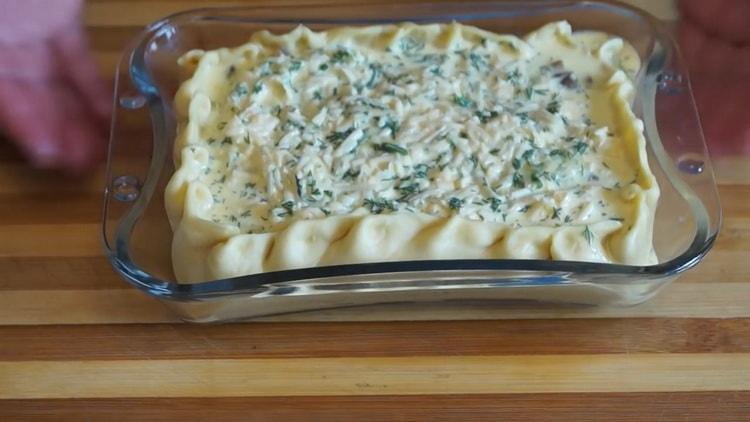 To prepare a pie with mushrooms in the oven, fill the filling with filling