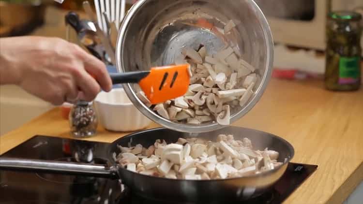 To make a pie with chicken and mushrooms, add mushrooms to the pan