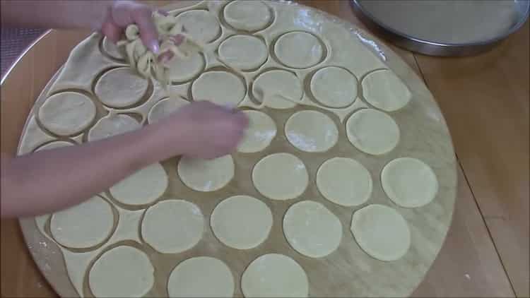 Roll the dough to make a meat pie