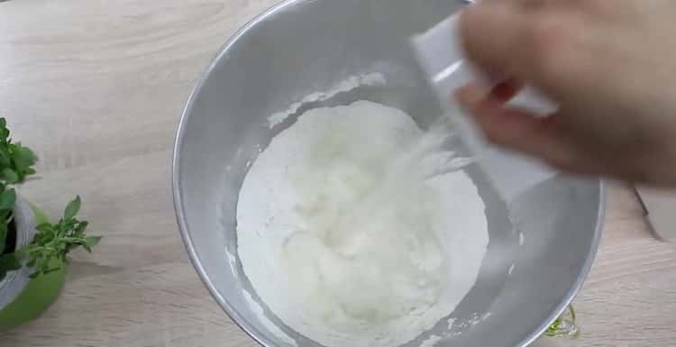 To make 4 cheese pizza, prepare the ingredients