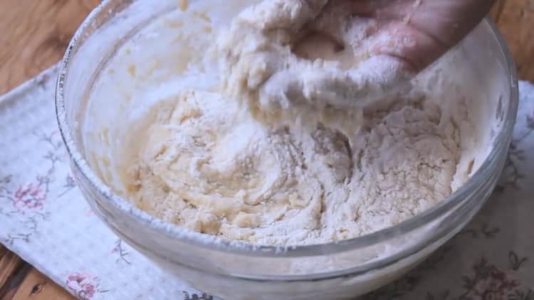 To make pizza in the oven, knead the dough