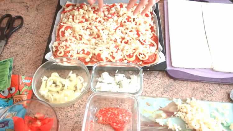 To make puff pastry pizza in the oven, cheese