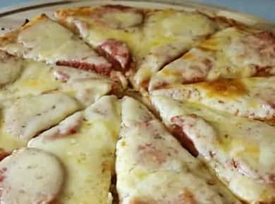 How to learn how to cook delicious pizza on kefir in the oven