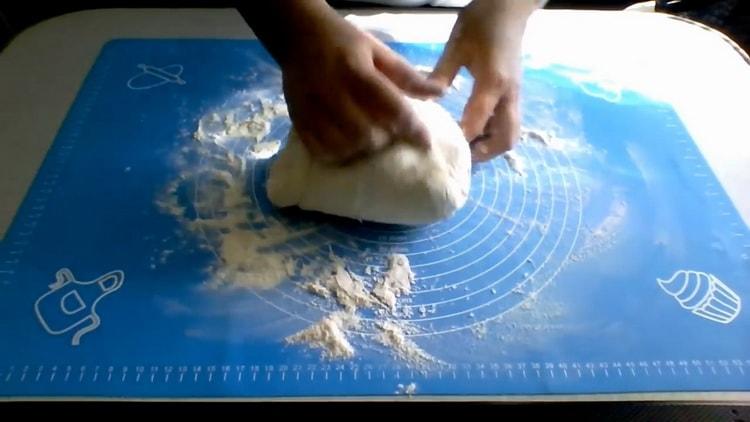 Knead the dough to make kefir pizza in the oven