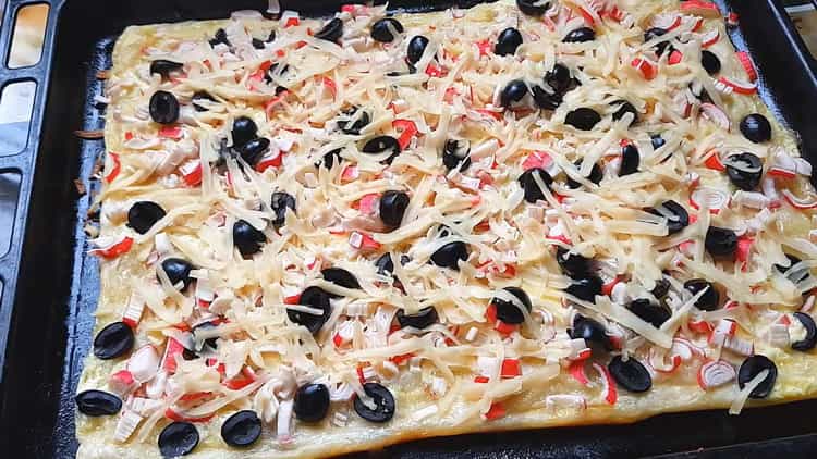 pizza with crab sticks ready