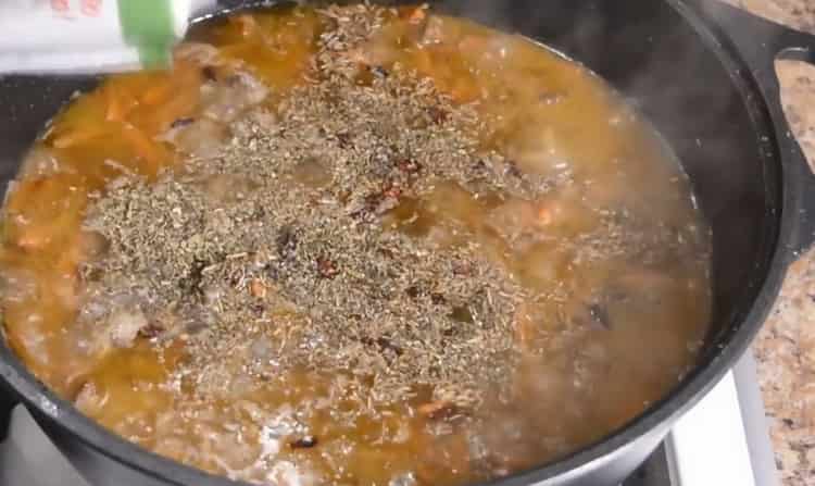 To make lamb pilaf in a cauldron, add spices