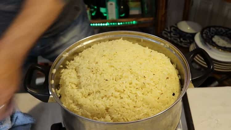 To prepare pork pilaf in a pan, prepare the ingredients