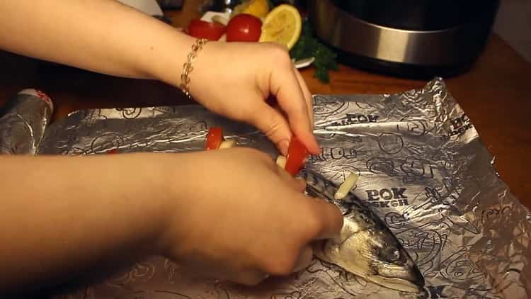 To cook fish in a slow cooker, prepare the foil