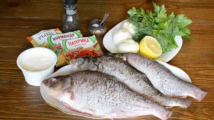 Za kuhanje ribe na kiselom vrhnju u pećnici pripremite sastojke