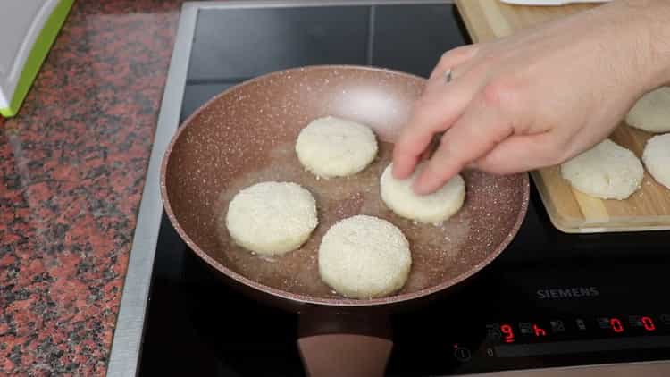 Fry the cod cutlets in a pan