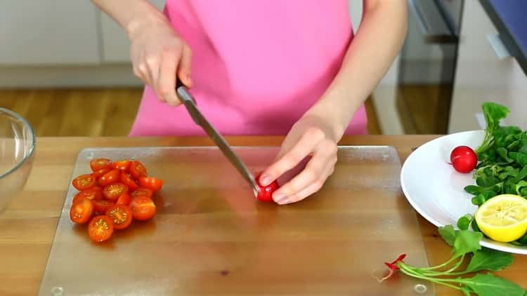 To cook a salmon skate in the oven, chop a tomato