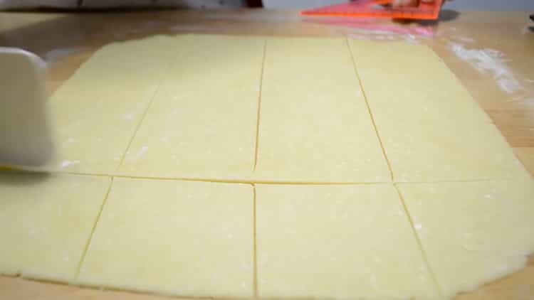 To make cottage cheese cookies envelopes, cut the dough