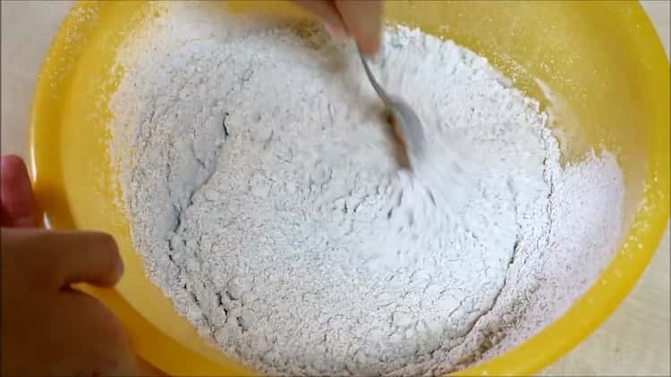 Mix the ingredients to make the bread.