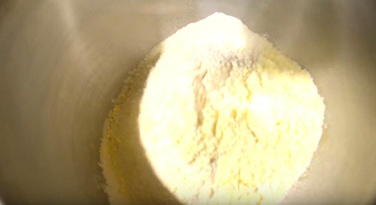 Add the milk powder to the flour.