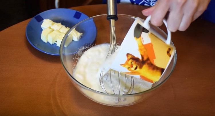 Add the dough to the egg mass.