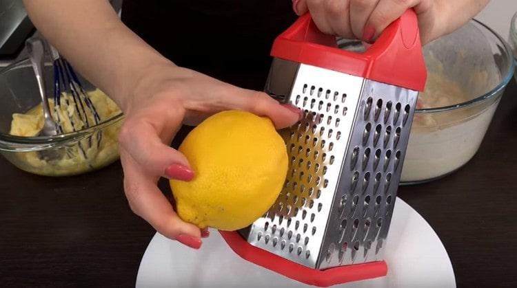 Grate the lemon zest.