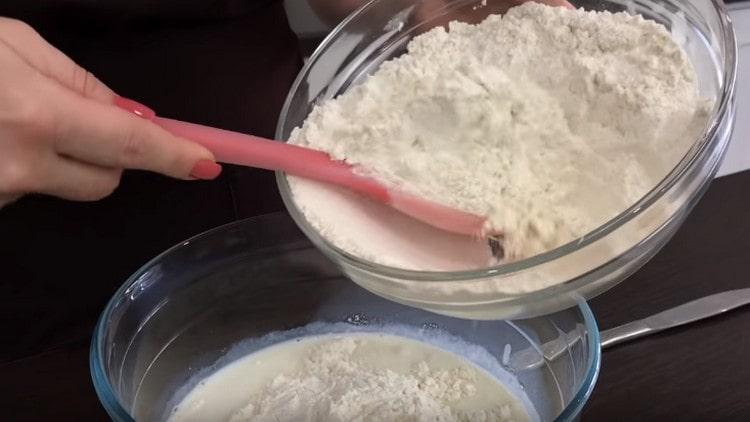 A quarter of the flour is added to milk.