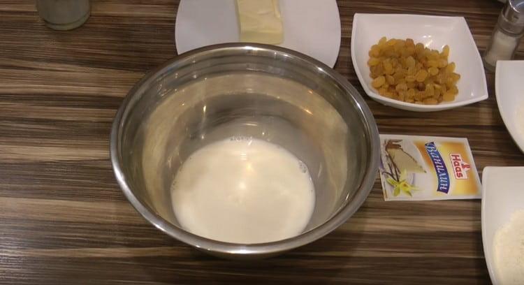 Pour warm milk into a bowl.