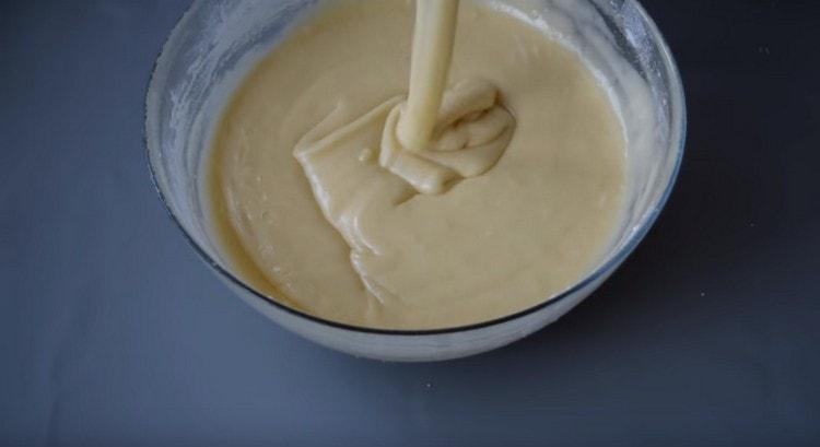 By consistency, this dough should resemble thick sour cream.