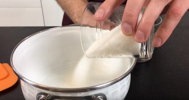 Pour sugar into a saucepan.