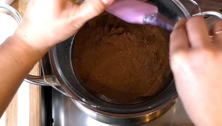 Pour cocoa into a saucepan.