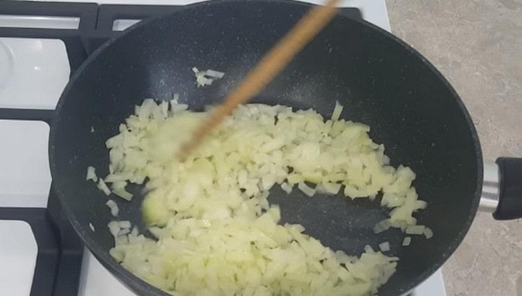 Fry the onion until soft.