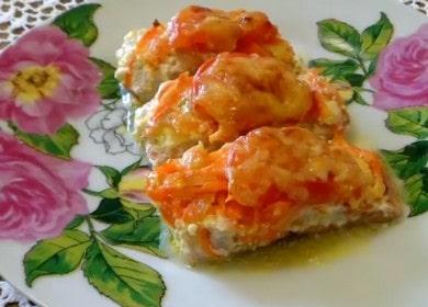 Juicy pink salmon baked under a coat of tomatoes and cheese in the oven