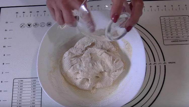 Add vegetable oil to the dough.