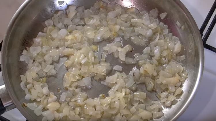Grind the onion and fry it until soft.