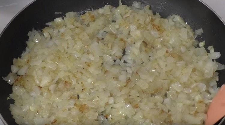 Grind onions and fry until golden brown.