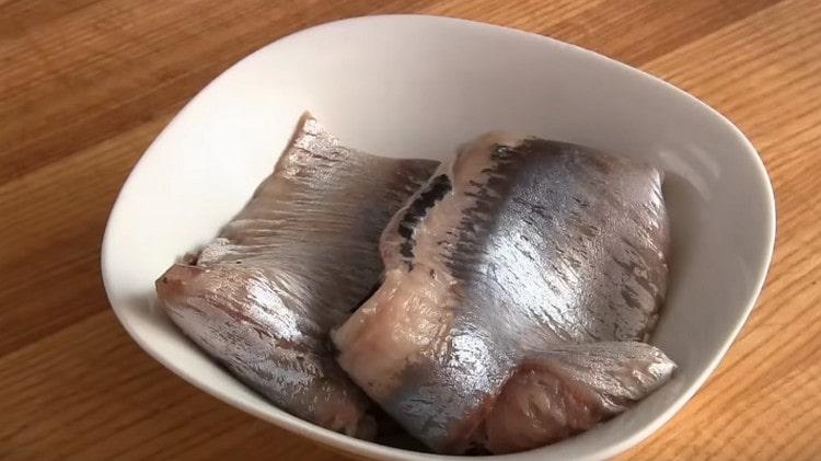 We clean herring, share on filet.