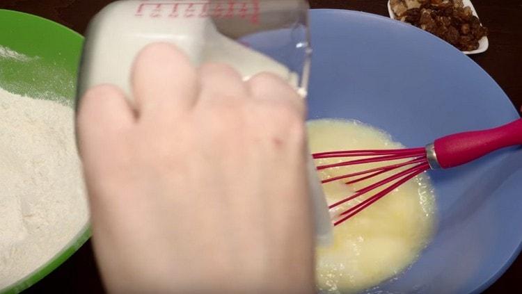 After mixing the eggs with butter, add kefir to them.