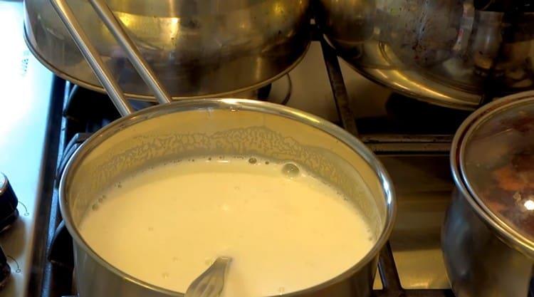 Bring milk with sugar to a boil