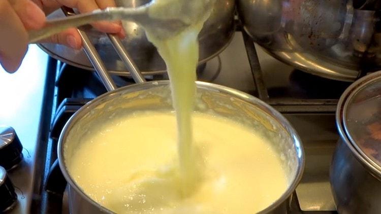 Cook the cream until thickened.