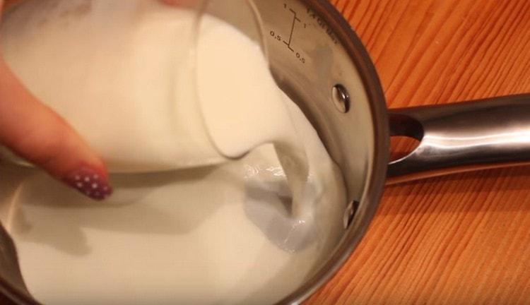 Pour milk into the stewpan.