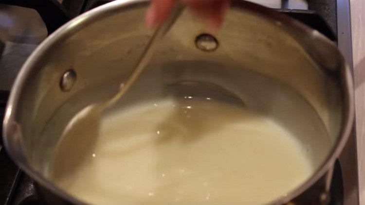 We put the custard base on the stove and cook until thickened.