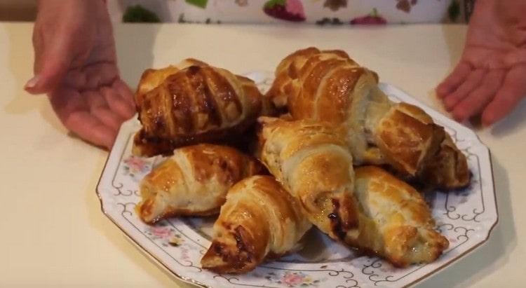 Appetizing croissants from puff yeast-proof pastry are ready.