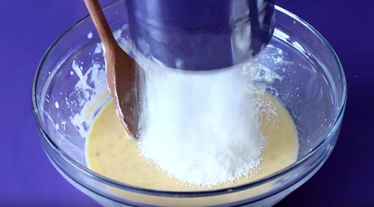 After mixing the liquid components, sift the flour to them.
